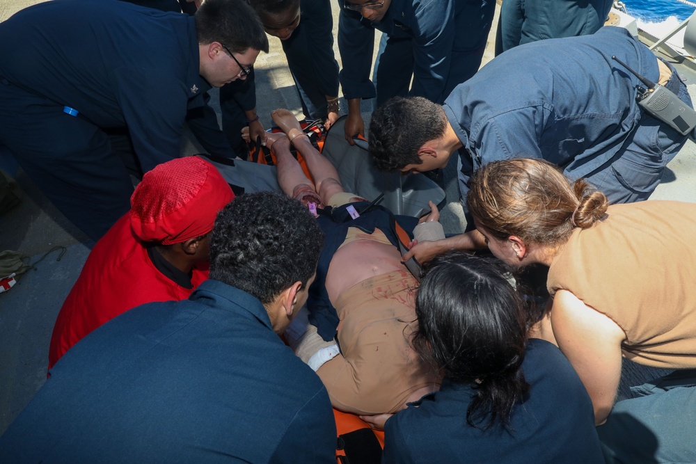 Sailors aboard the USS Howard conduct a medical training team drill in the South China Sea