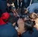 Sailors aboard the USS Howard conduct a medical training team drill in the South China Sea