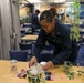 Sailors aboard the USS Howard host a friendship bracelet making event in the South China Sea