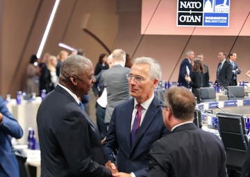 Secretaries Shake Hands At NATO Summit