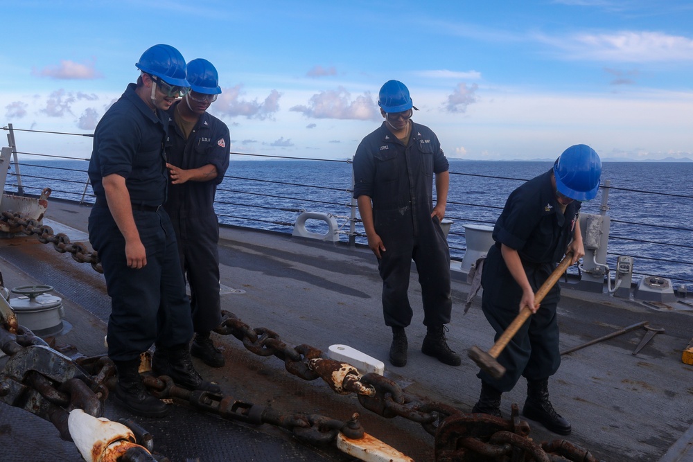 Sailors aboard the USS Howard conduct a sea and anchor detail in Okinawa, Japan