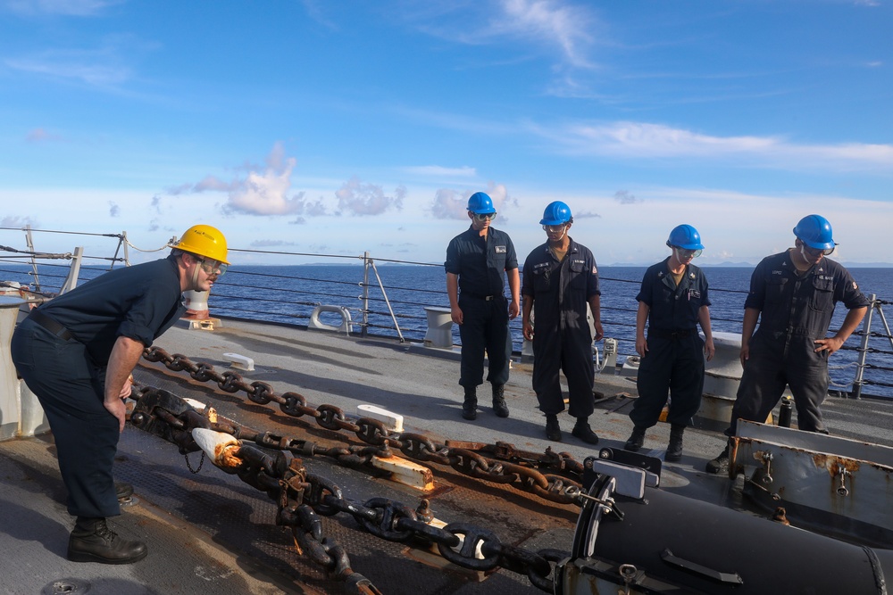 Sailors aboard the USS Howard conduct a sea and anchor detail in Okinawa, Japan