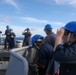 Sailors aboard the USS Howard conduct a sea and anchor detail in Okinawa, Japan