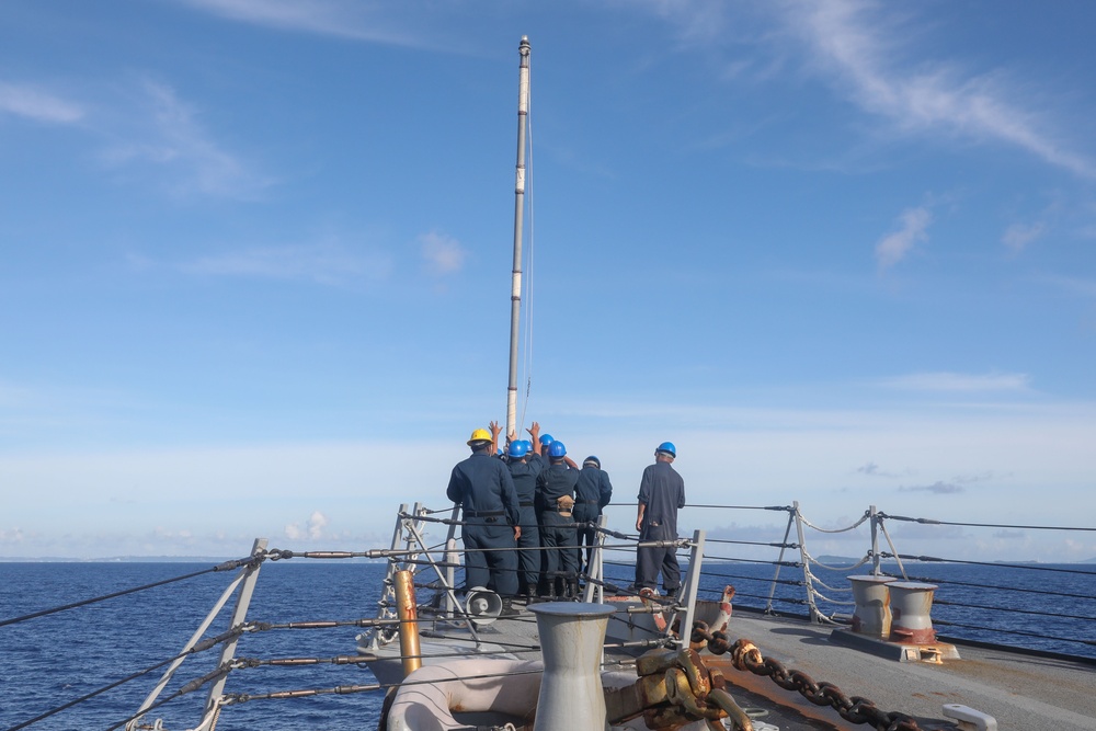 Sailors aboard the USS Howard conduct a sea and anchor detail in Okinawa, Japan