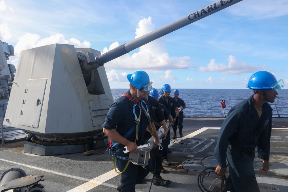 Sailors aboard the USS Howard conduct a sea and anchor detail in Okinawa, Japan