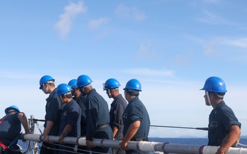 Sailors aboard the USS Howard conduct a sea and anchor detail in Okinawa, Japan