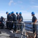 Sailors aboard the USS Howard conduct a sea and anchor detail in Okinawa, Japan