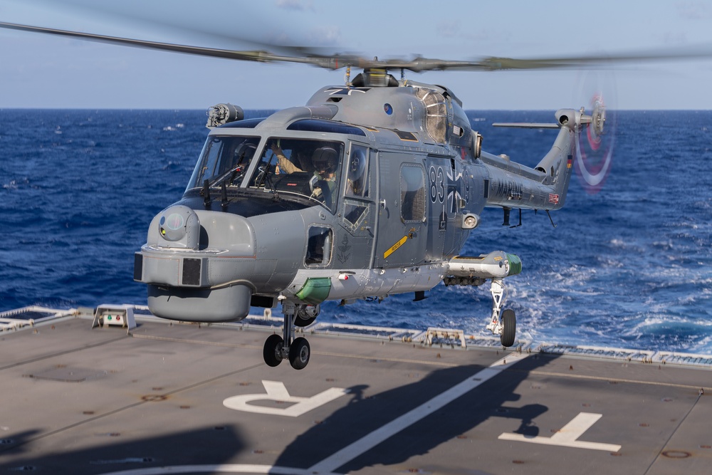 German Navy Lynx helicopter landing on Netherlands Navy ship HNLMS Tromp