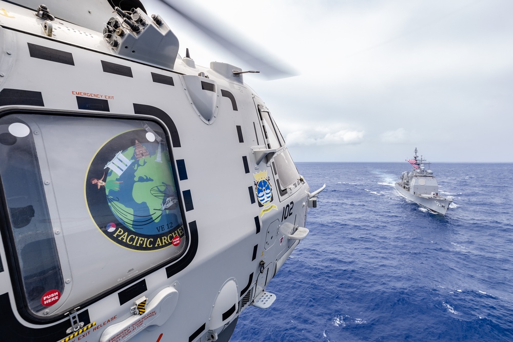 Netherlands NH90NFH hovering infront of USS Princeton.