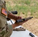 1st Lt. Brianna Mirmina loads her M17 pistol