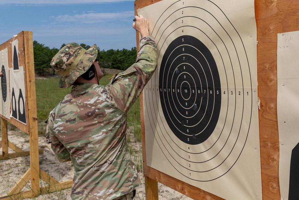 1st Lt.  Michael Vigh scores his target