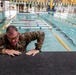 Capt. Zachary Grimes climbs up a platform
