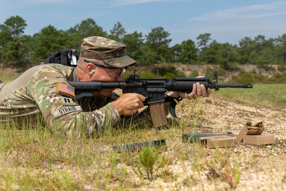 Capt. Jack Straub fires an M4 rifle