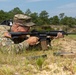 Capt. Jack Straub fires an M4 rifle