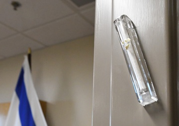 Fort Drum celebrates new Jewish sanctuary with mezuzah dedication
