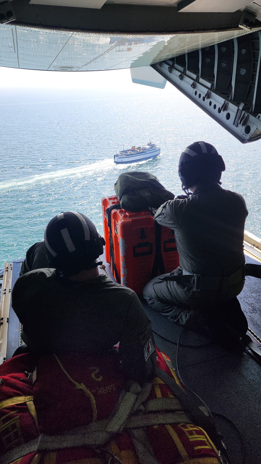 Coast Guard Air Station Cape Cod HC-144 aircrew performs emergency drop training