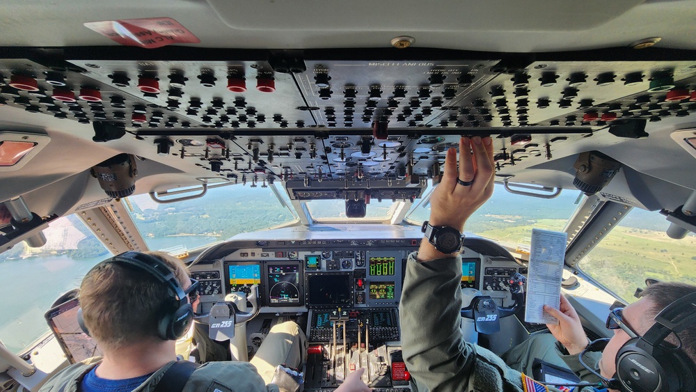 Coast Guard Air Station Cape Cod HC-144 aircrew performs emergency drop training