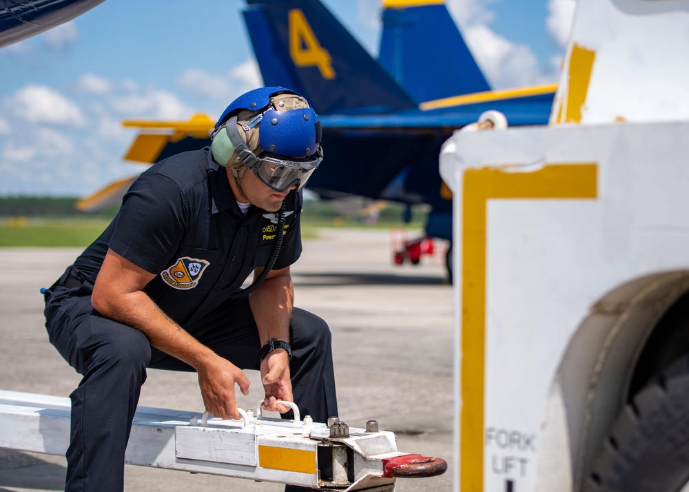 The Navy Flight Demonstration Squadron, the Blue Angels, perform in Pensacola Beach, FL.