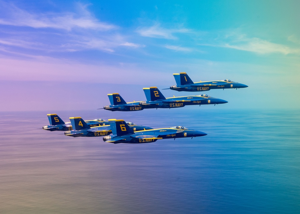 The Navy Flight Demonstration Squadron, the Blue Angels, perform in Pensacola Beach, FL.