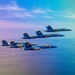 The Navy Flight Demonstration Squadron, the Blue Angels, perform in Pensacola Beach, FL.