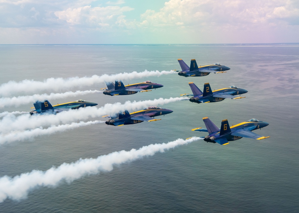 The Navy Flight Demonstration Squadron, the Blue Angels, perform in Pensacola Beach, FL.