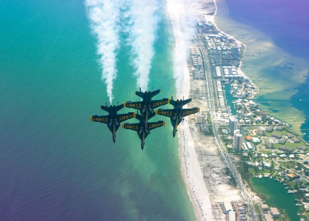 The Navy Flight Demonstration Squadron, the Blue Angels, perform in Pensacola Beach, FL.