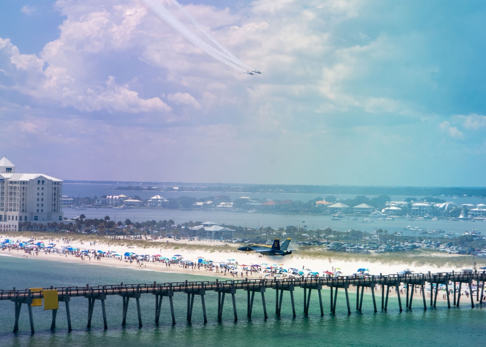 The Navy Flight Demonstration Squadron, the Blue Angels, perform in Pensacola Beach, FL.