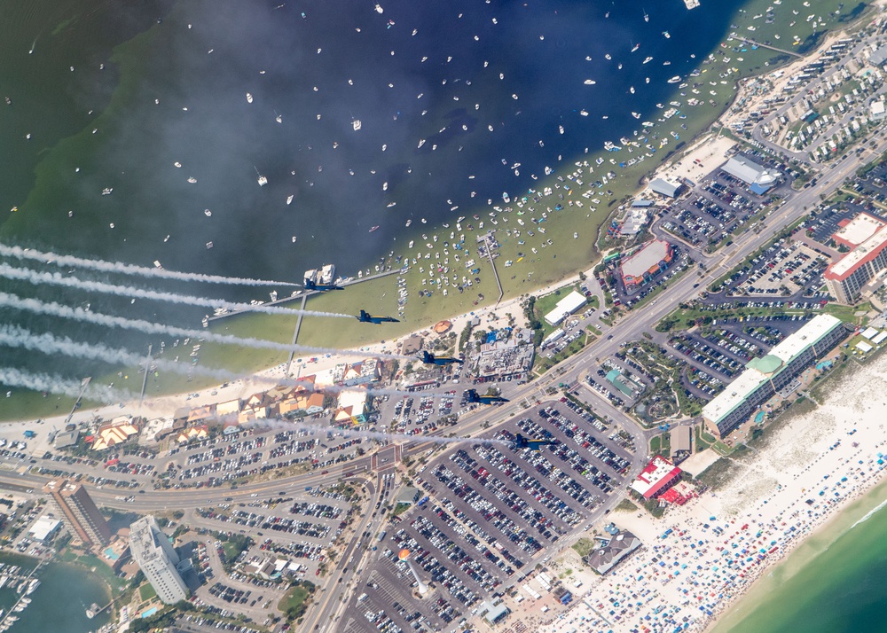 The Navy Flight Demonstration Squadron, the Blue Angels, perform in Pensacola Beach, FL.