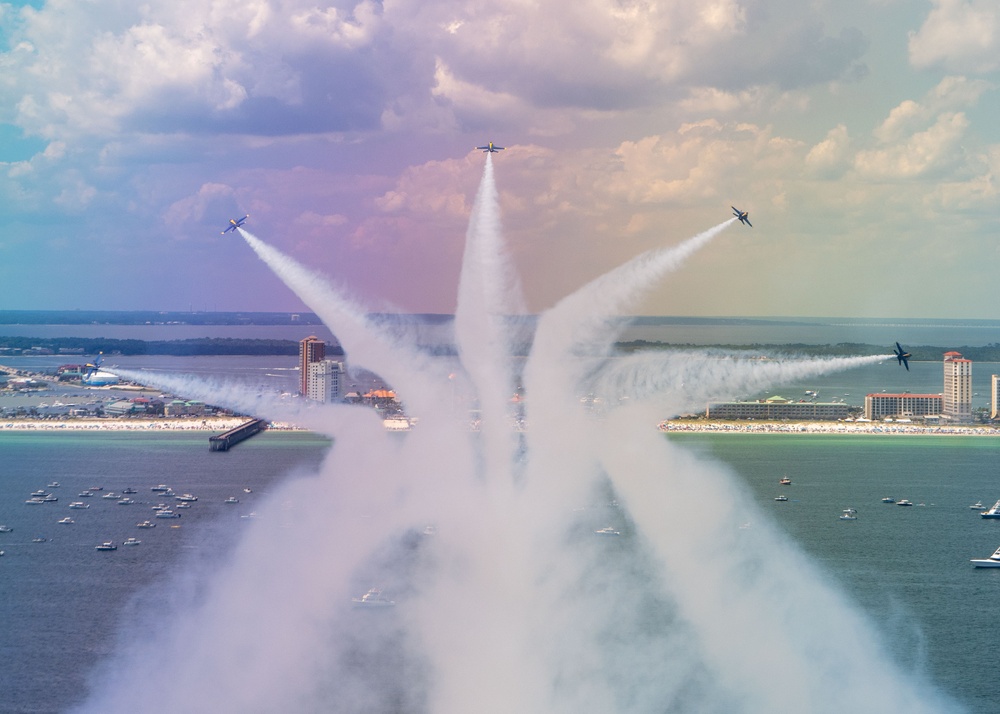 The Navy Flight Demonstration Squadron, the Blue Angels, perform in Pensacola Beach, FL.