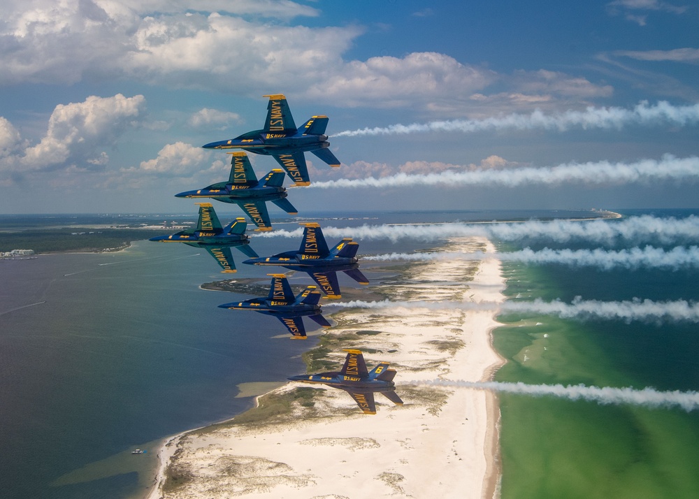 The Navy Flight Demonstration Squadron, the Blue Angels, perform in Pensacola Beach, FL.