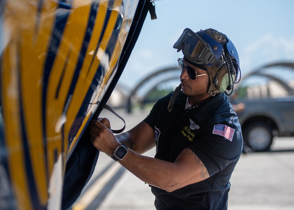 The Navy Flight Demonstration Squadron, the Blue Angels, perform in Pensacola Beach, FL.