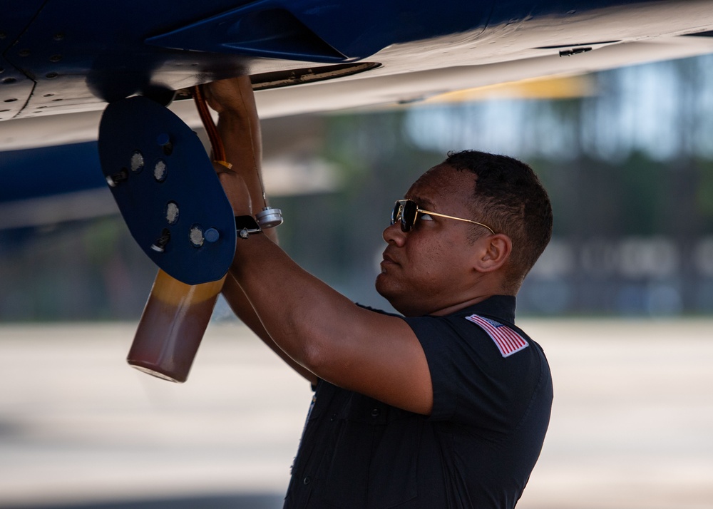 The Navy Flight Demonstration Squadron, the Blue Angels, perform in Pensacola Beach, FL.