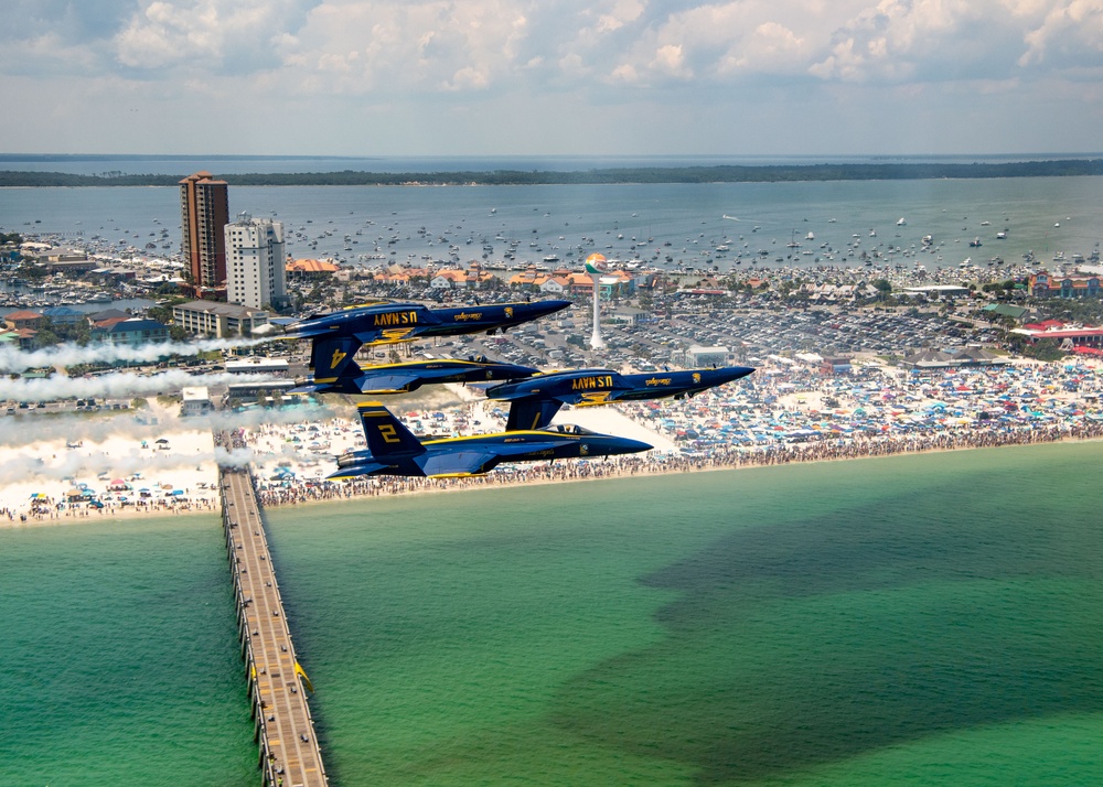 The Navy Flight Demonstration Squadron, the Blue Angels, perform in Pensacola Beach, FL.