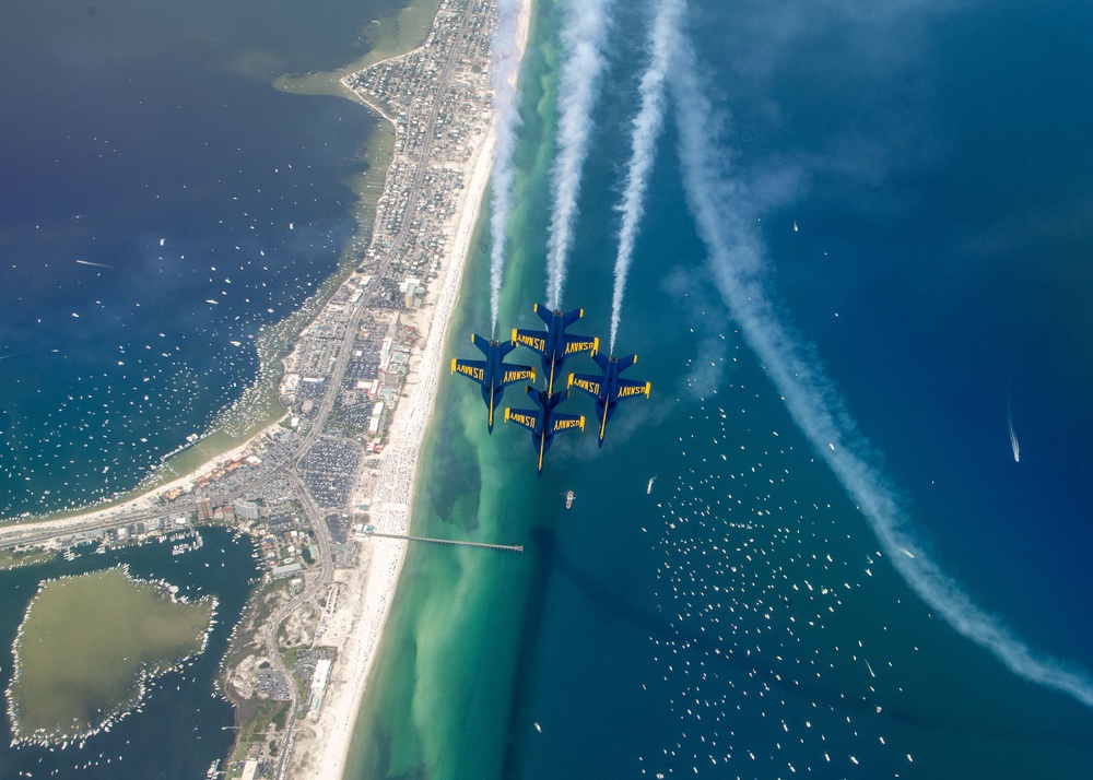 The Navy Flight Demonstration Squadron, the Blue Angels, perform in Pensacola Beach, FL.