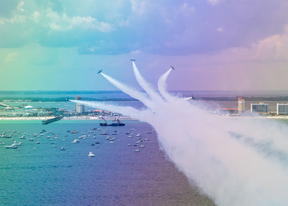 The Navy Flight Demonstration Squadron, the Blue Angels, perform in Pensacola Beach, FL.