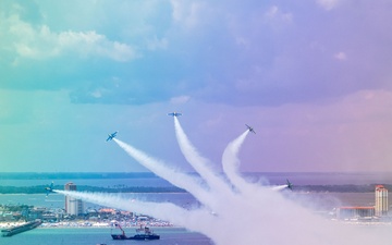 The Navy Flight Demonstration Squadron, the Blue Angels, perform in Pensacola Beach, FL.