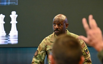 Command First Sgt. Dent speaks at a Squadron Commanders' Course