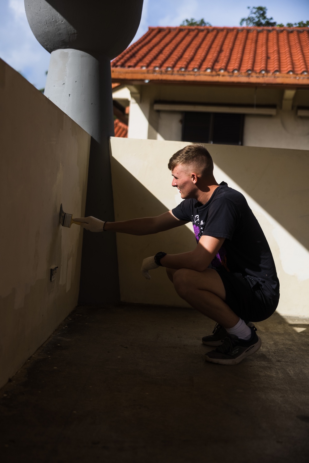 MCB Camp Blaz Marines volunteer to paint pavilions at Chamorro Village