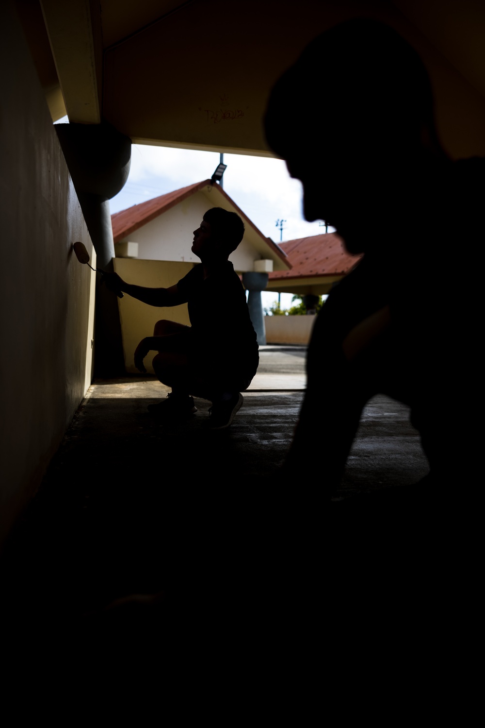 MCB Camp Blaz Marines volunteer to paint pavilions at Chamorro Village