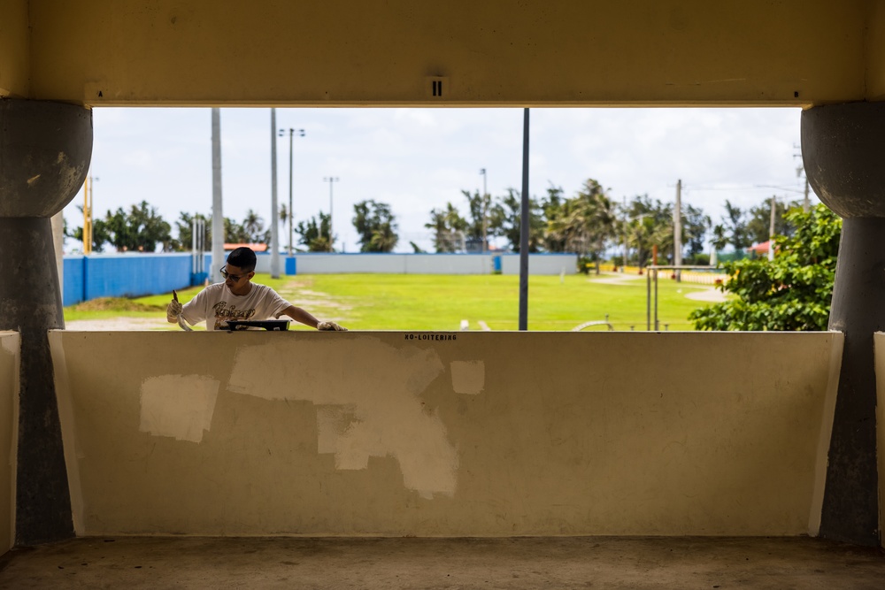 MCB Camp Blaz Marines volunteer to paint pavilions at Chamorro Village