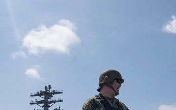 Nimitz Sailor Stands Watch On The Flight Deck