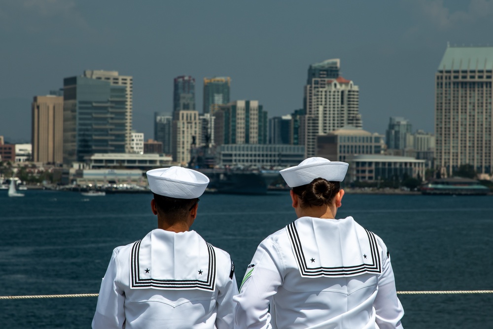 Nimitz Sailors Stand On Flight Deck