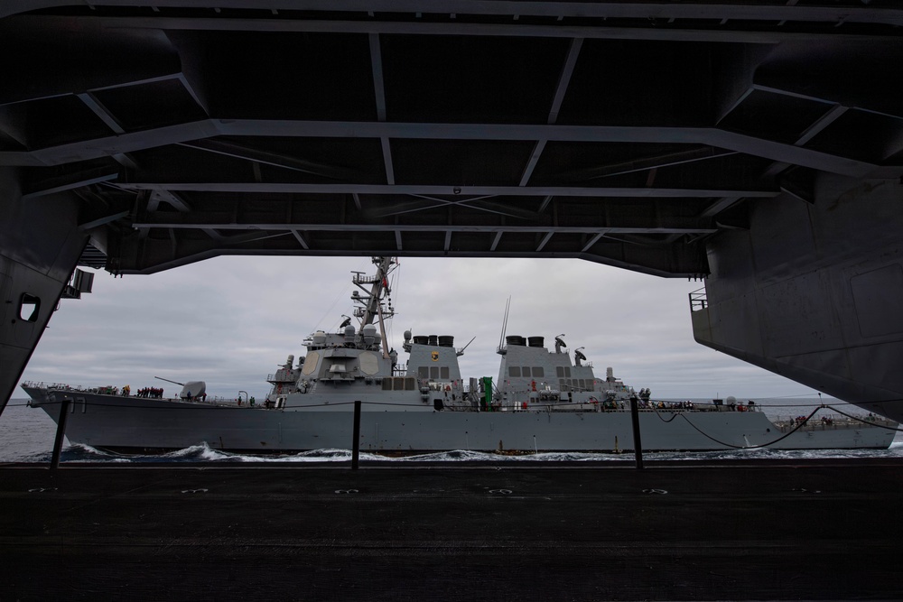 Abraham Lincoln conducts a fueling-at-sea with USS O’Kane