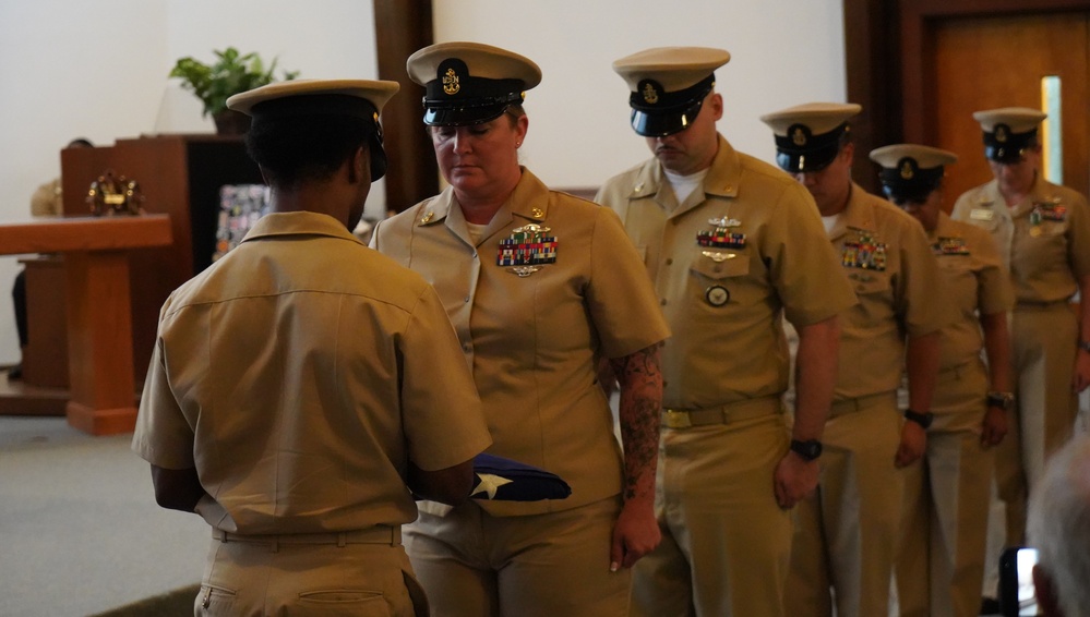 Flag passing detail during retirement ceremony