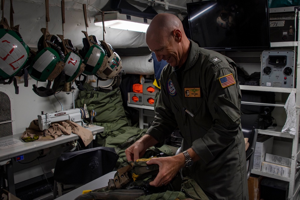 Capt. Pete Riebe participates in helicopter operations aboard Abraham Lincoln