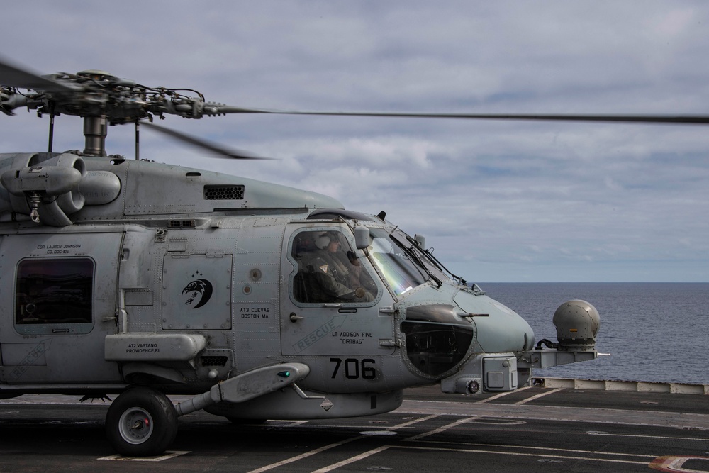 Capt. Pete Riebe participates in helicopter operations aboard Abraham Lincoln