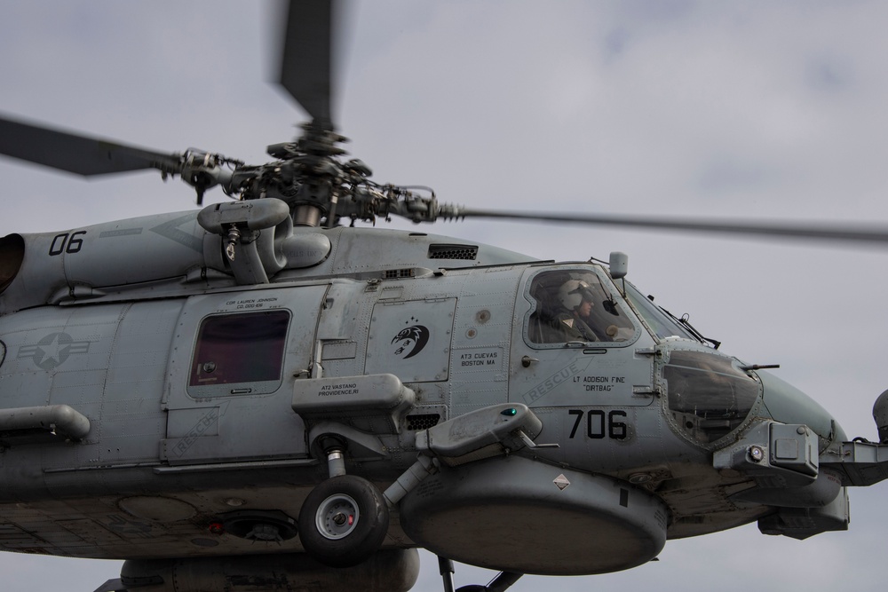 Capt. Pete Riebe participates in helicopter operations aboard Abraham Lincoln