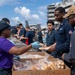 USS Ronald Reagan (CVN 76) holds a steel beach picnic for the 4th of July