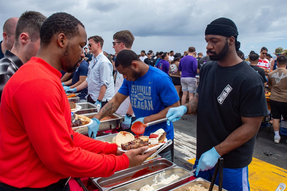 USS Ronald Reagan (CVN 76) holds a steel beach picnic for the 4th of July