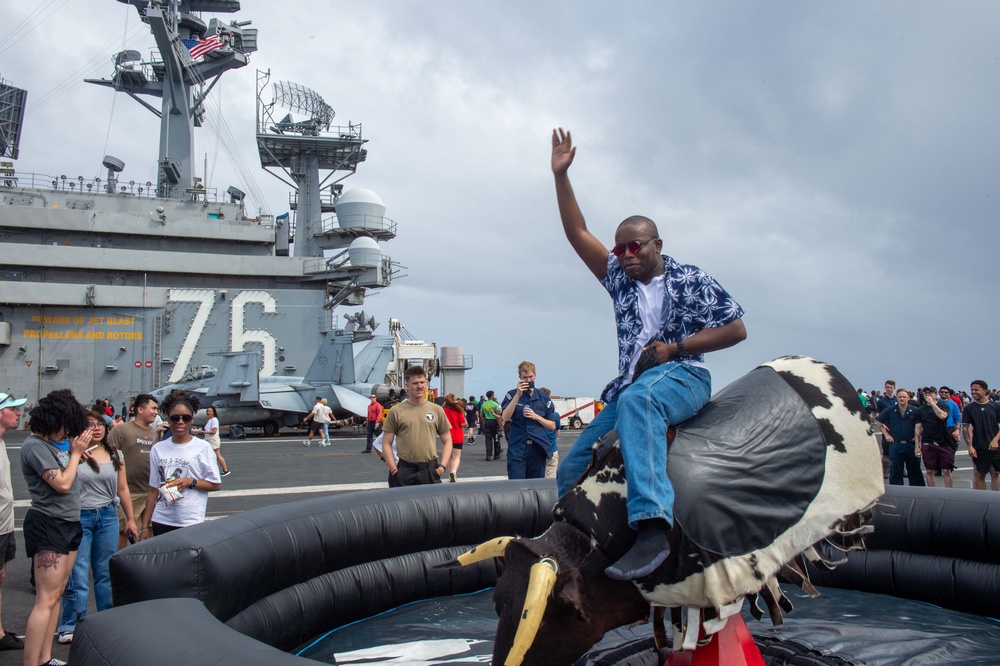 USS Ronald Reagan (CVN 76) holds a steel beach picnic for the 4th of July